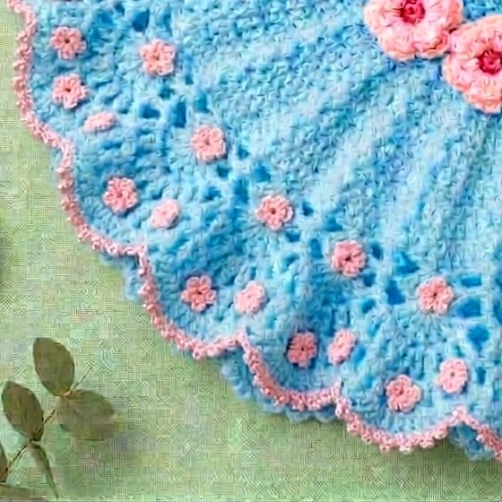 Close-up of the flowered skirt and hem