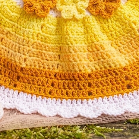 Close-up of the yellow and orange stitches