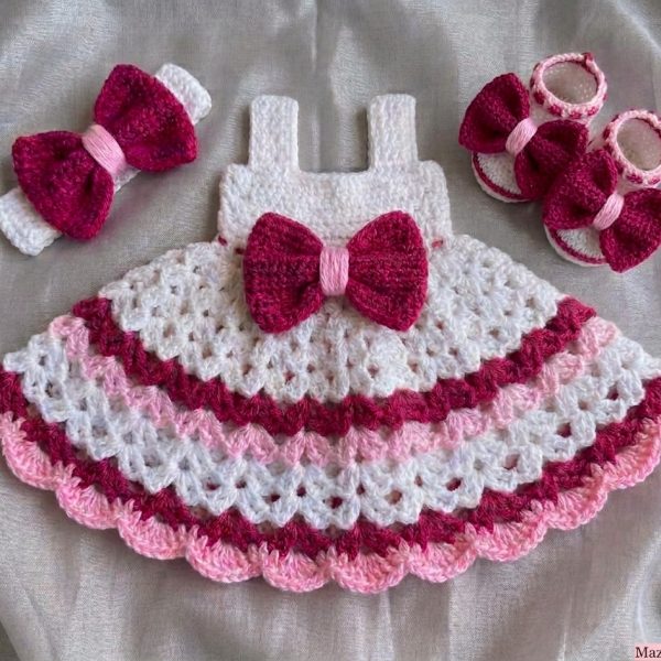 White crochet baby dress with maroon and pink stripes, bow headband and booties