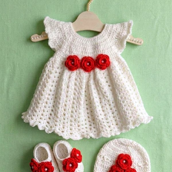 White crochet baby dress with red roses, cap and booties