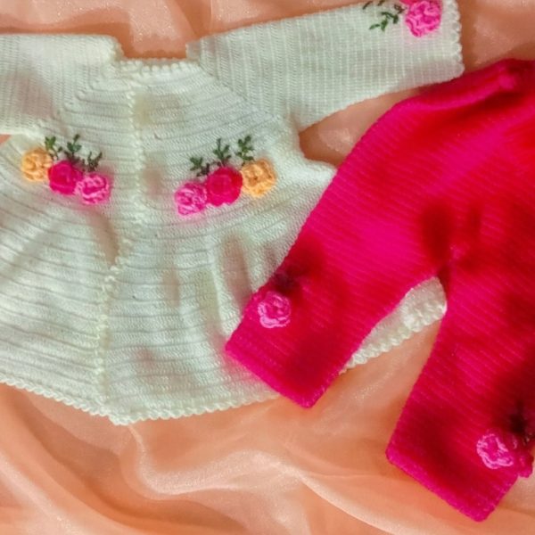 white and shocking pink crochet baby dress