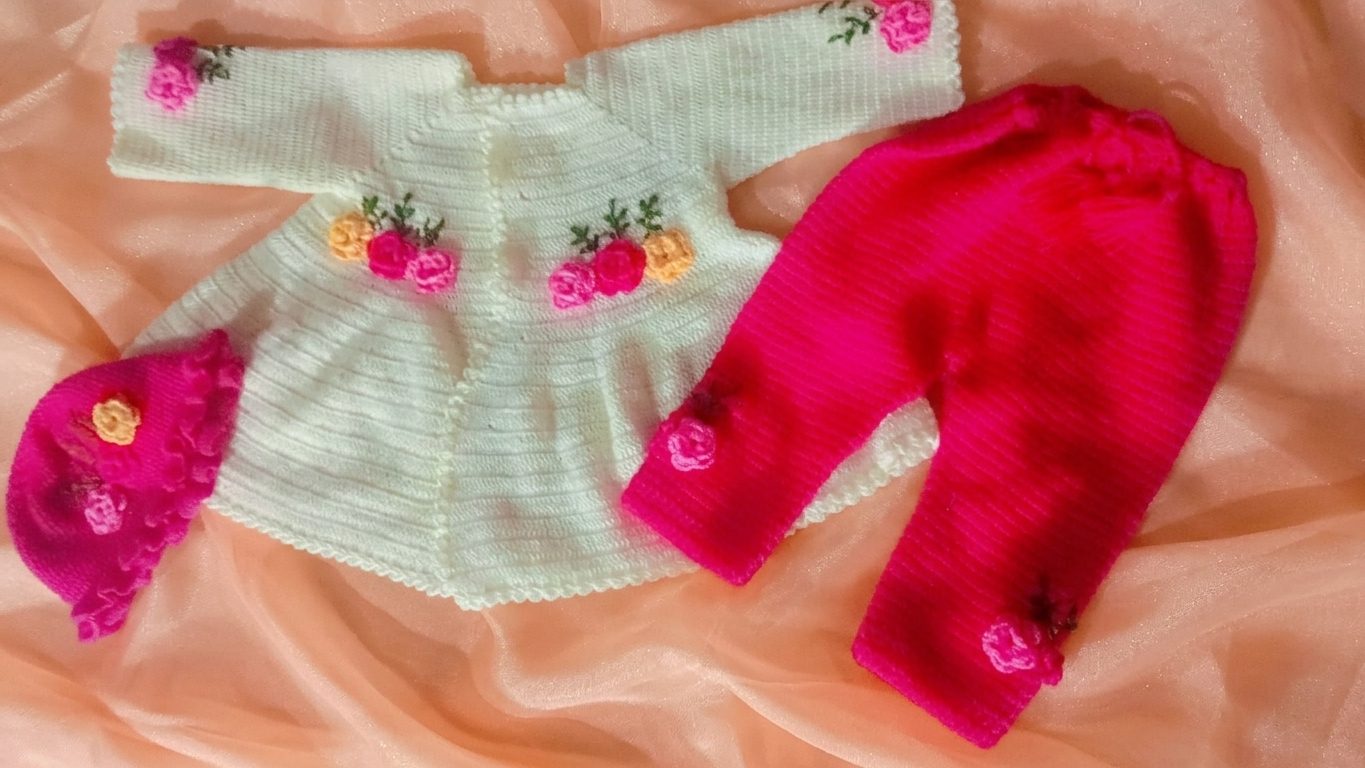 white and shocking pink crochet baby dress